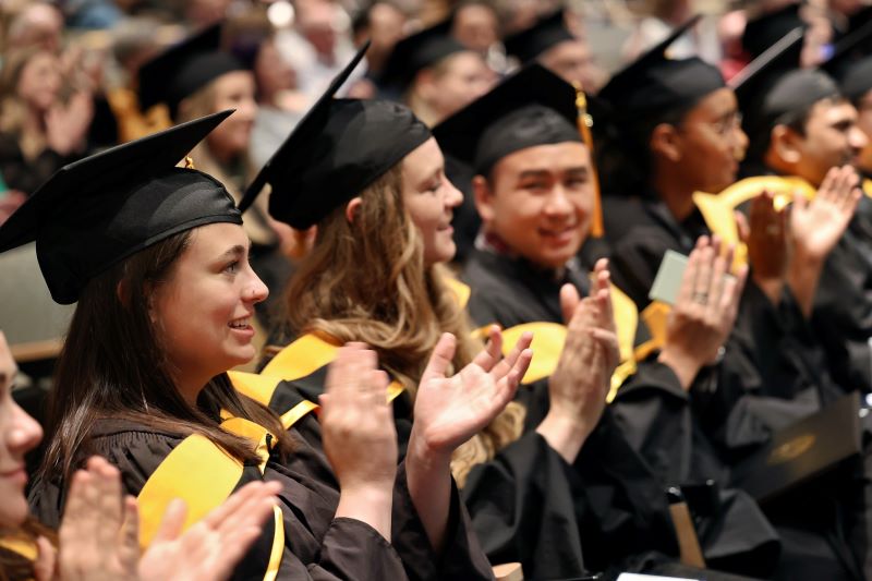 CU Anschutz Graduates in Regalia at a Spring Convcocation