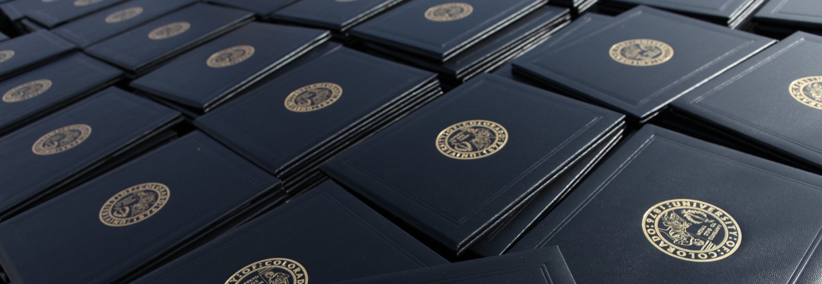 stacks_of_diploma_holders